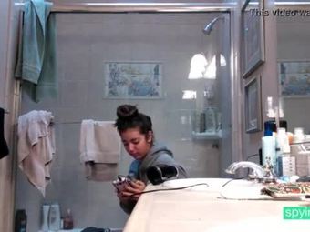 Brunette teen showering on hidden spy cam